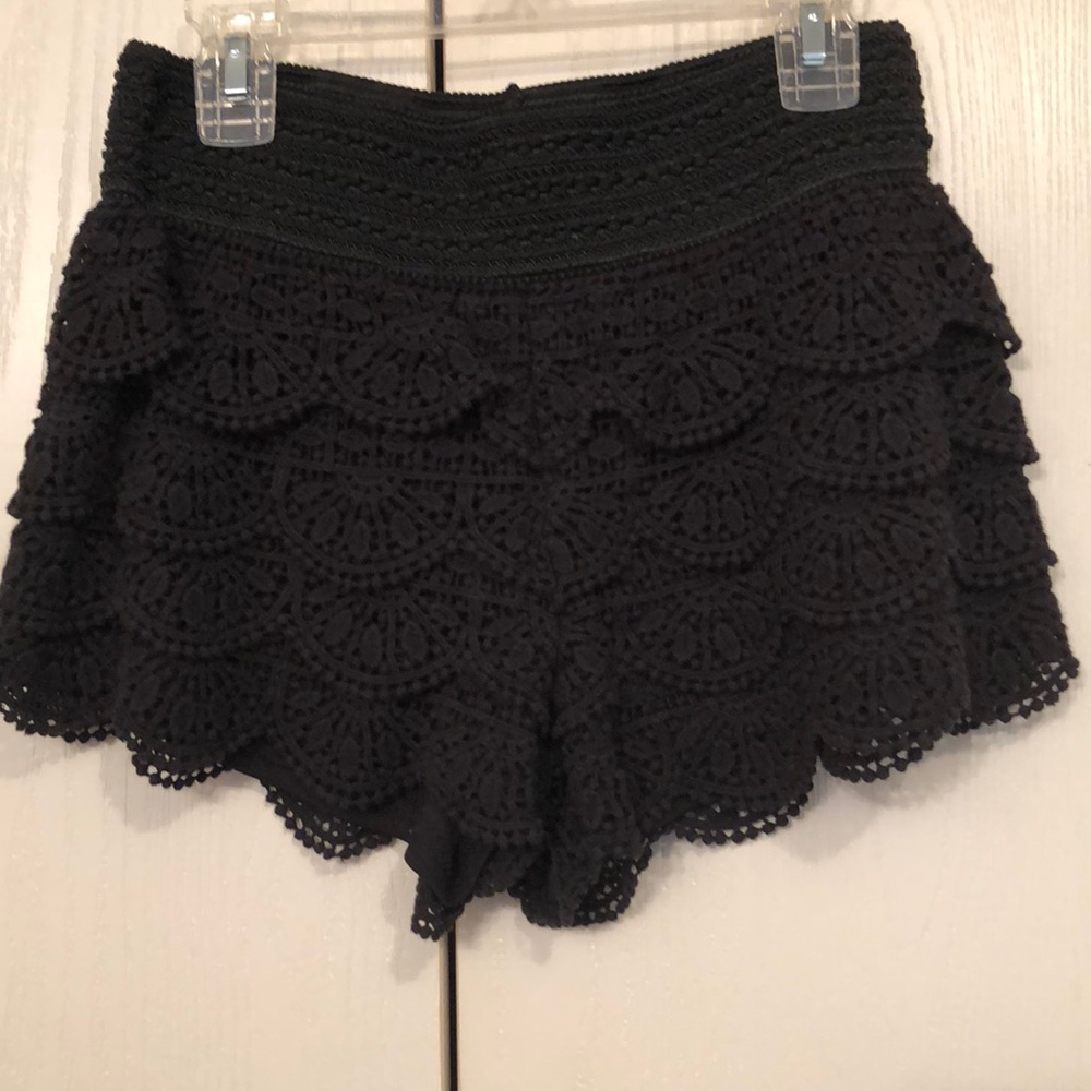 Black dressy lace shorts.